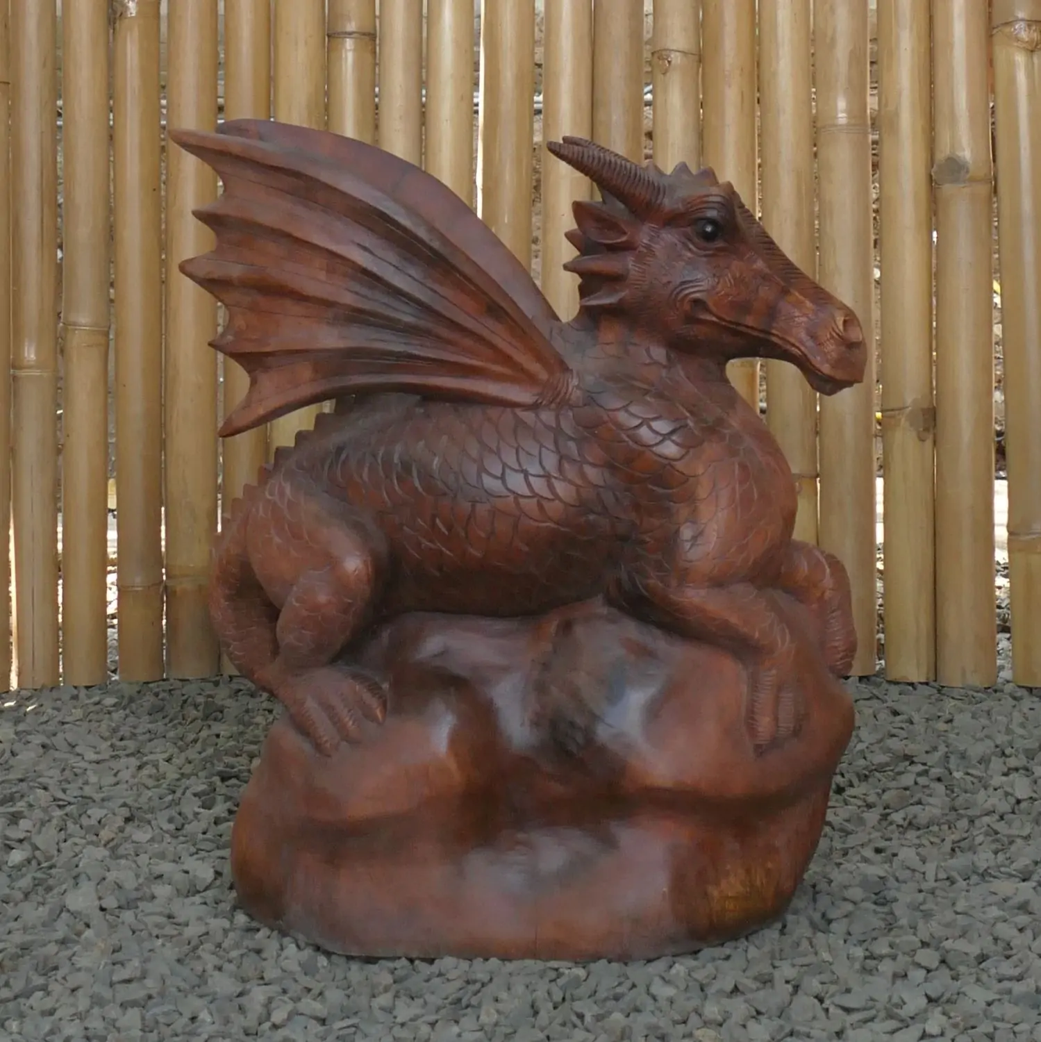  Product image 4 of the product “Dragon with leg lifted on the left made from suar wood, about 50cm Height ”